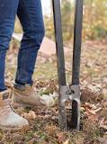 What is the fastest way to dig a fence post hole?