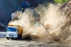 How do construction sites control dust?