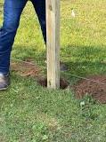 How do you dig holes in a 4×4 post?