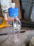 How do you make a spray water bottle?
