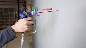 What is an ideal distance between the wall and sprayer?