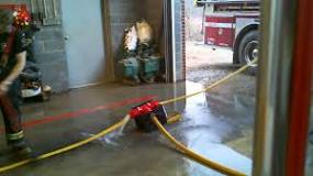 How heavy is a firefighter hose?