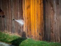 How long does it take to stain a fence with a sprayer?