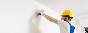 How do you texture drywall with a sprayer?