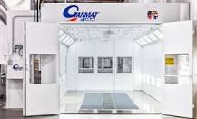 What is a downdraft paint booth?