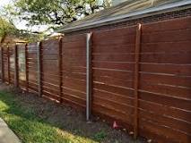 Are metal or wood fence posts better?