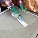 How many times should you trowel concrete?