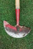 How do you use a spade shovel for edging?