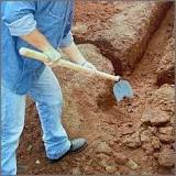 What is the best tool for digging a shallow trench?