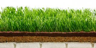 Why do you put sand on artificial grass?