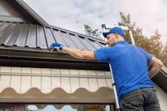 How do you clean gutters without a pressure washer?