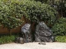 How do you arrange stones in a Japanese garden?