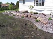 How do you clean dirty landscaping rocks?