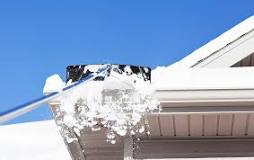 How do you get snow off sloped roof?