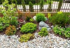 How do you keep a landscape rock in place?