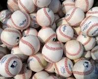 What does the MLB do with dirty baseballs?
