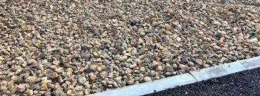 What goes under garden pebbles?