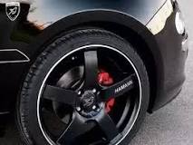 What is the red thing behind a wheel?