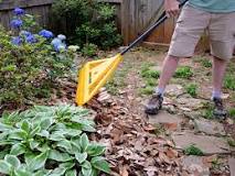 Is blowing leaves faster than raking?
