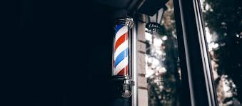 Why are barber shops blue red white?